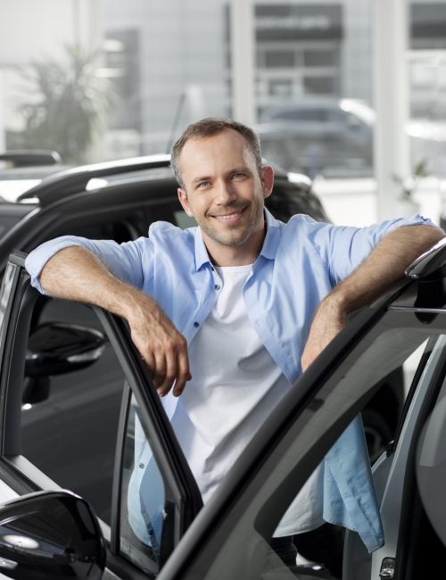 close-up-customer-with-business-person-car-dealership